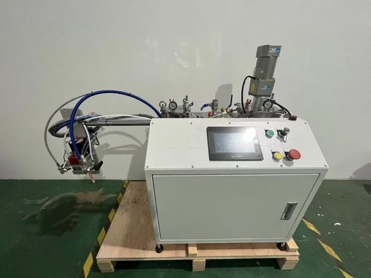 Machine à coller pour le dosage précis de mélange de matériaux à deux composants