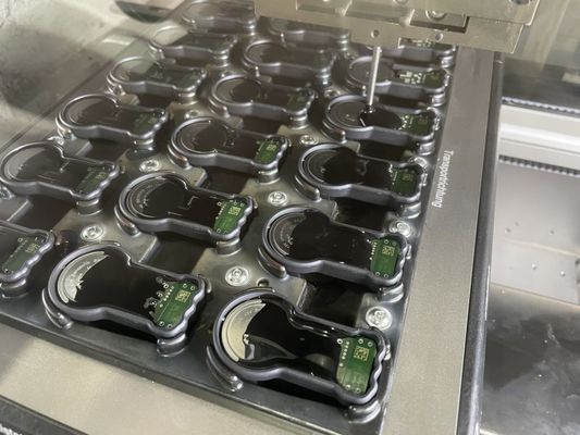 Machine de mise en pot de condensateur avec distributeur epoxy en résine PU à 2 composants