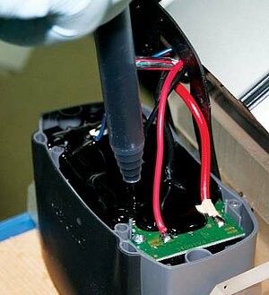 AB Machine de mise en pot de colle pour la mise en pot et l'encapsulation de PCB